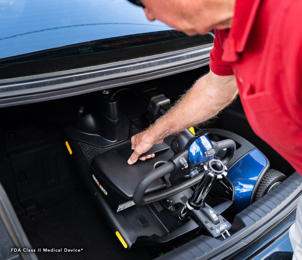 Man Putting Mobility Equipment in Car | Handicap Equipment